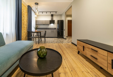 Modern one-bedroom apartment in a renovated building.